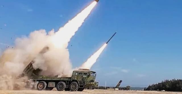 Taiwan stays on high alert as Chinese ships pull back after massive drills